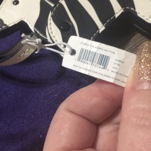 Tory Burch Zooey Zebra key chain. - Picture 6 of 8